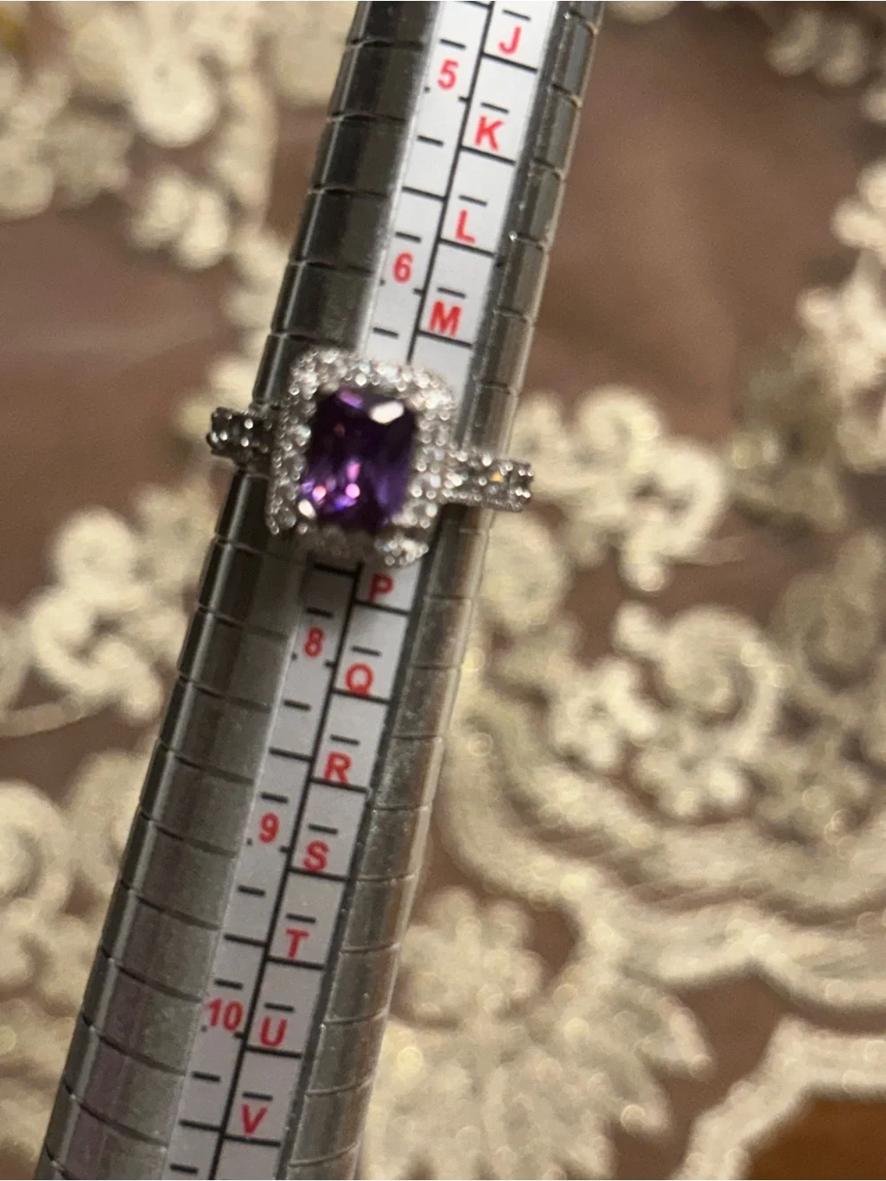 Silver Ring with Purple Gemstone and Halo Accents. Size 7